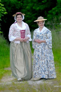 Photograph of 2 women in colonial costumes