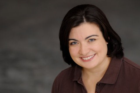 Headshot of a beautiful woman with brown hair